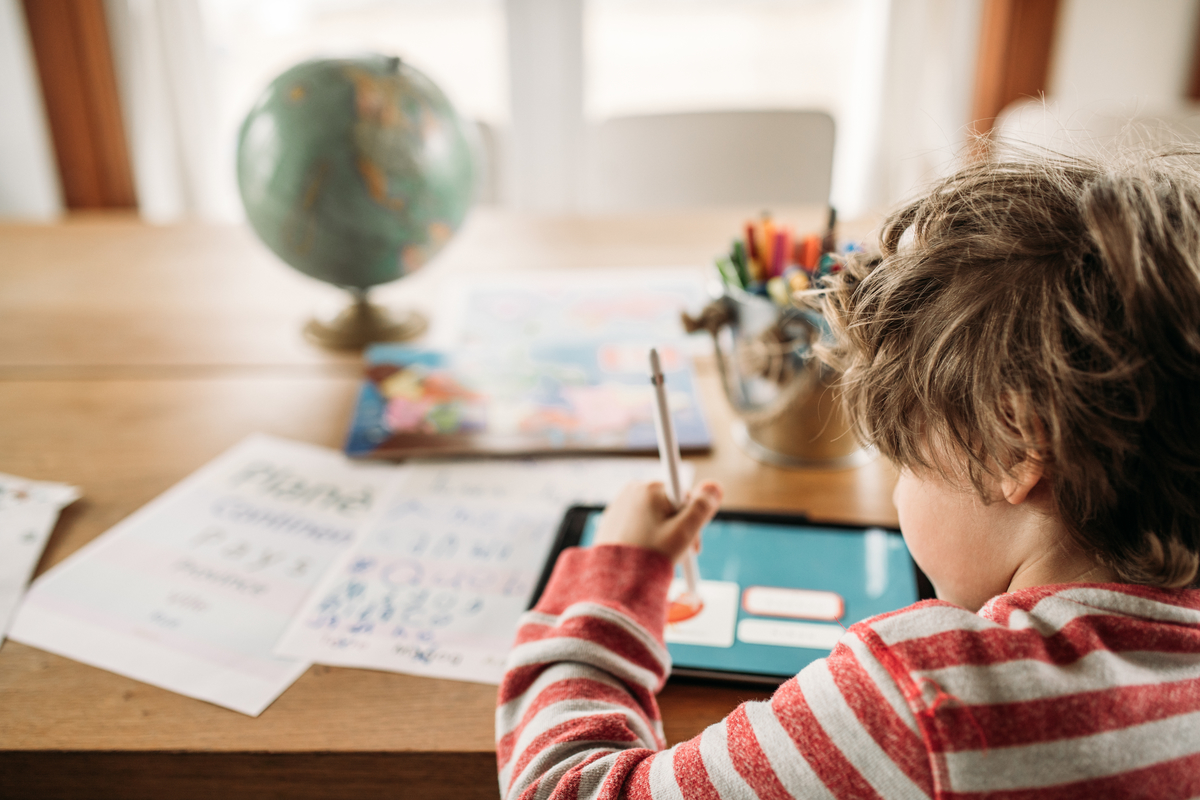 A child doing school work at home